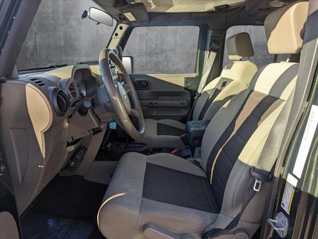 used 2010 Jeep Wrangler Unlimited car, priced at $14,645