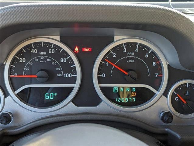 used 2010 Jeep Wrangler Unlimited car, priced at $14,645