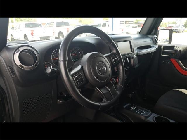 used 2015 Jeep Wrangler Unlimited car, priced at $15,000