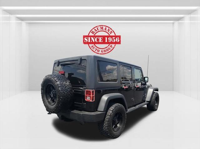 used 2015 Jeep Wrangler Unlimited car, priced at $15,000