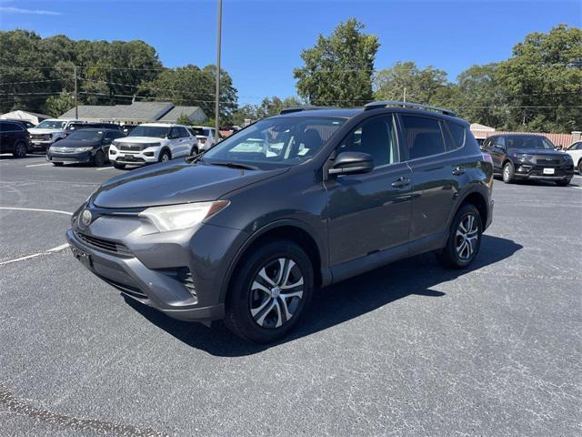 used 2018 Toyota RAV4 car, priced at $15,283