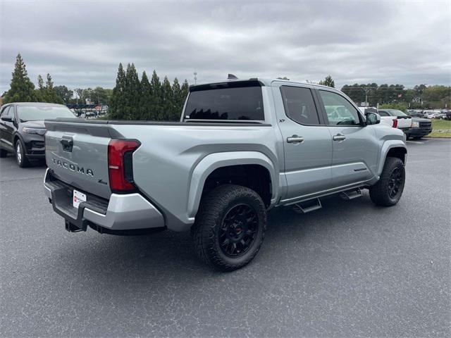 used 2025 Toyota Tacoma car, priced at $38,553
