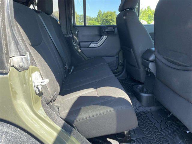 used 2015 Jeep Wrangler Unlimited car, priced at $12,579