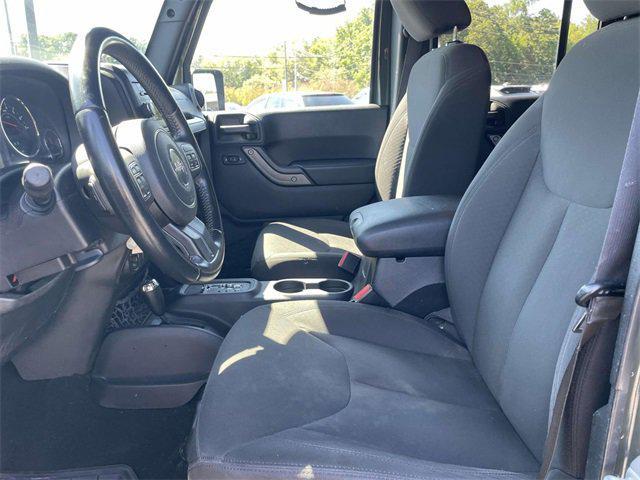 used 2015 Jeep Wrangler Unlimited car, priced at $12,579
