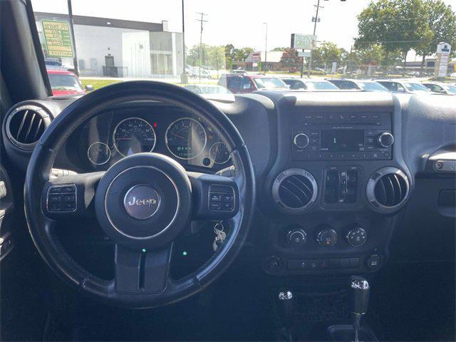used 2015 Jeep Wrangler Unlimited car, priced at $12,579