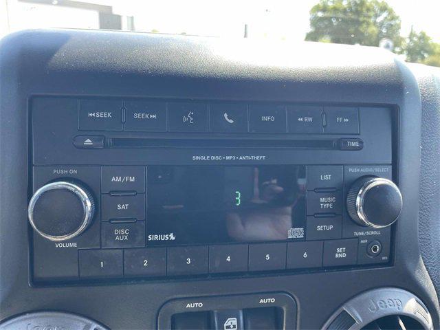 used 2015 Jeep Wrangler Unlimited car, priced at $12,579