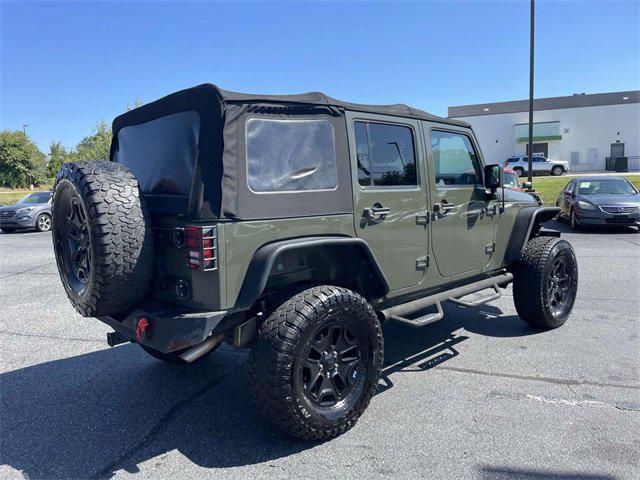 used 2015 Jeep Wrangler Unlimited car, priced at $12,579