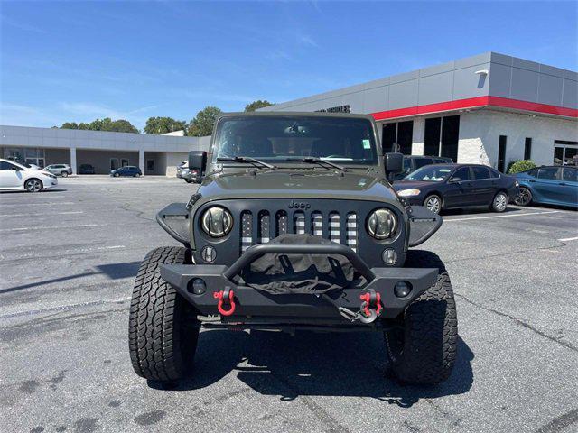 used 2015 Jeep Wrangler Unlimited car, priced at $12,579