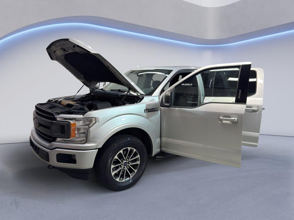 used 2018 Ford F-150 car, priced at $15,500