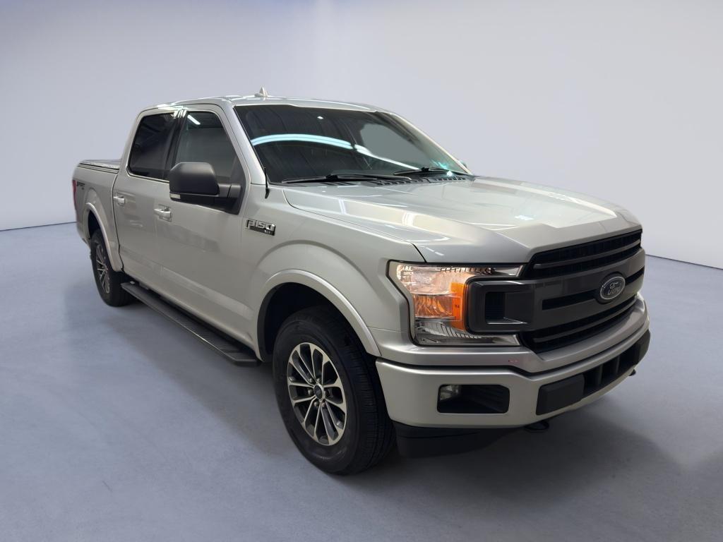 used 2018 Ford F-150 car, priced at $15,500