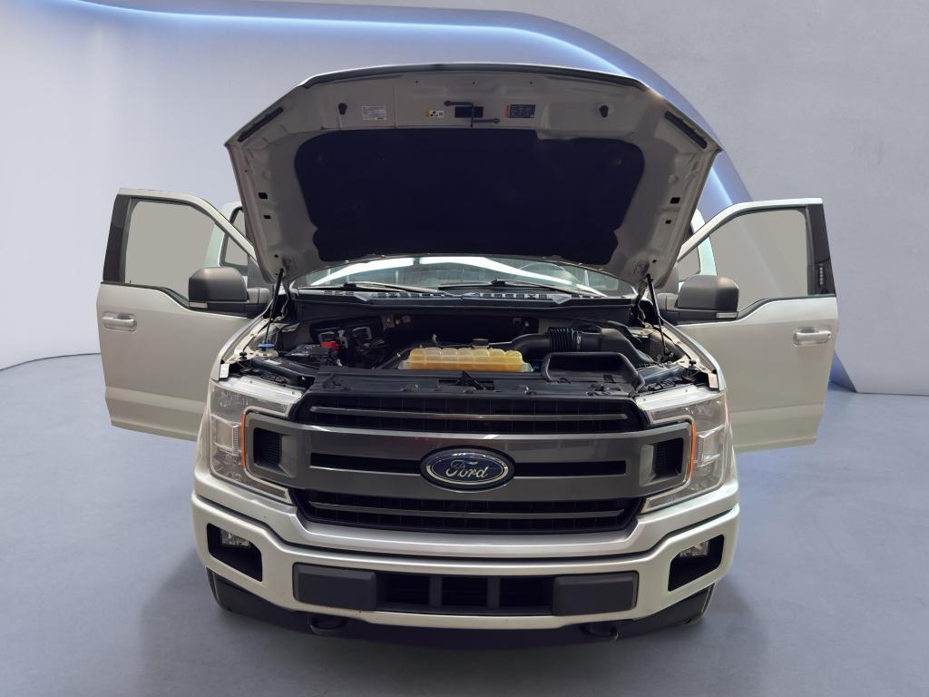 used 2018 Ford F-150 car, priced at $15,500