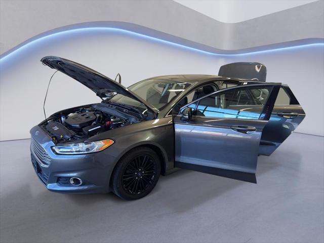 used 2016 Ford Fusion car, priced at $9,650