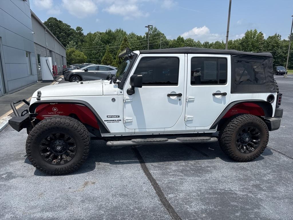 used 2015 Jeep Wrangler Unlimited car, priced at $16,999