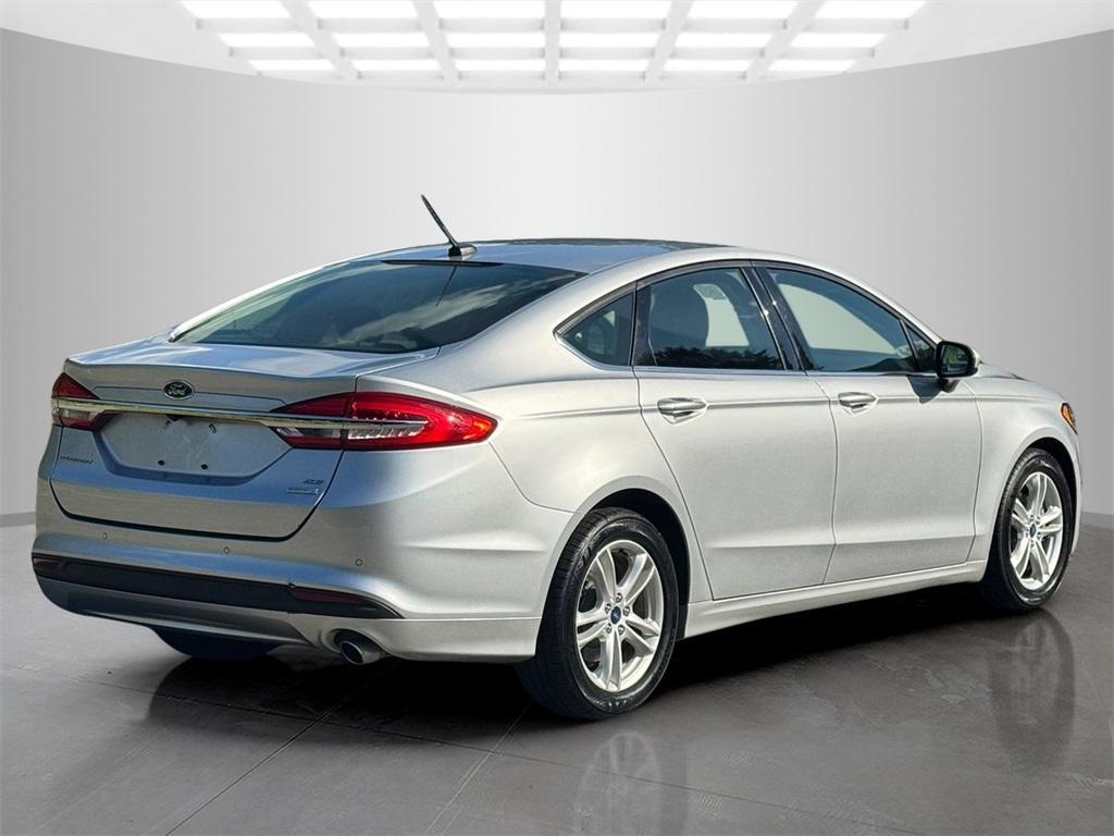 used 2018 Ford Fusion car, priced at $9,888