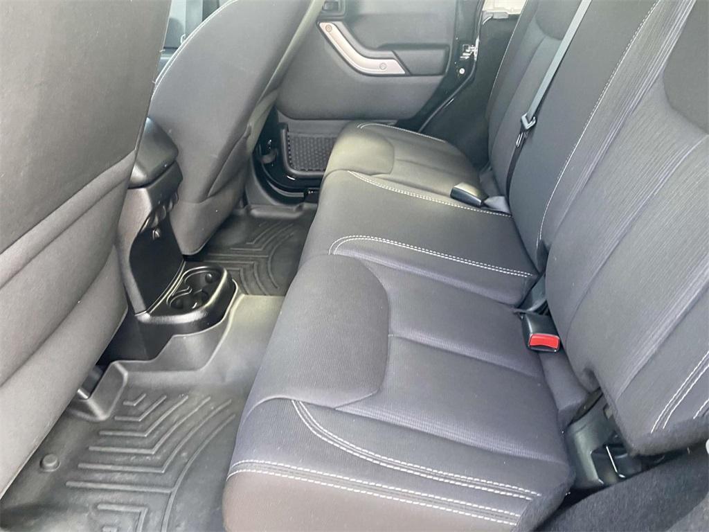 used 2014 Jeep Wrangler Unlimited car, priced at $19,495