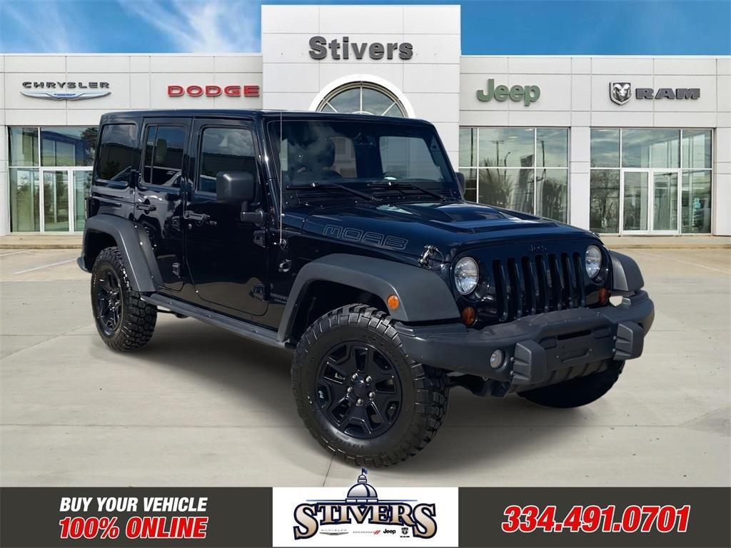 used 2013 Jeep Wrangler Unlimited car, priced at $16,995