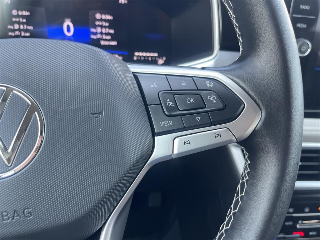 used 2025 Volkswagen Taos car, priced at $25,991