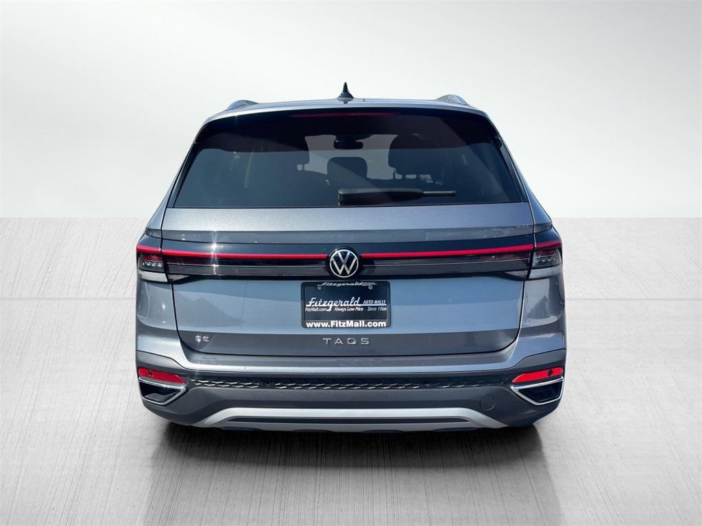 used 2025 Volkswagen Taos car, priced at $25,991