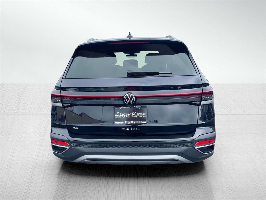 used 2025 Volkswagen Taos car, priced at $26,991