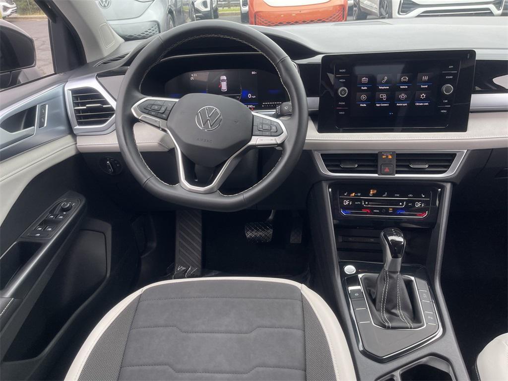 used 2025 Volkswagen Taos car, priced at $26,991