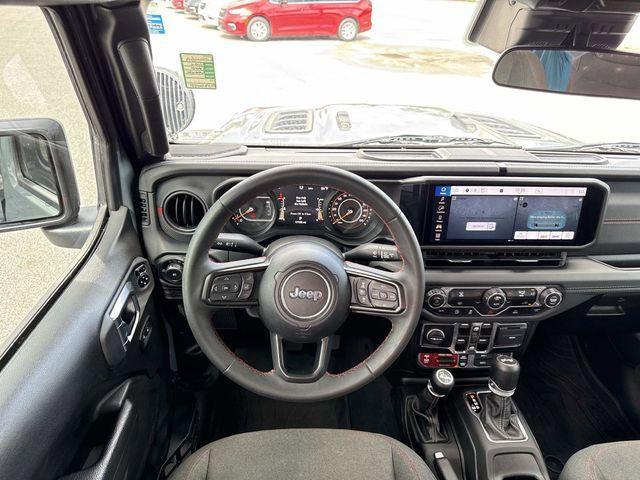 used 2024 Jeep Wrangler car, priced at $41,888