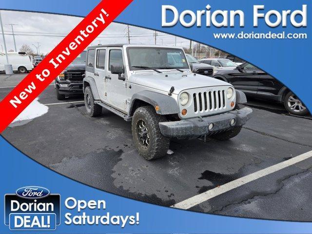 used 2010 Jeep Wrangler Unlimited car, priced at $11,995