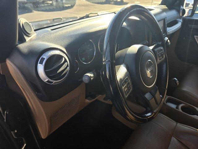 used 2012 Jeep Wrangler Unlimited car, priced at $14,295