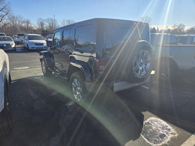 used 2012 Jeep Wrangler Unlimited car, priced at $14,295