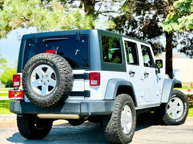 used 2014 Jeep Wrangler Unlimited car, priced at $18,900