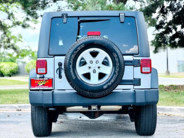 used 2014 Jeep Wrangler Unlimited car, priced at $13,900
