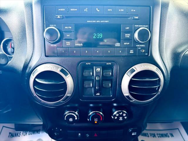 used 2014 Jeep Wrangler Unlimited car, priced at $13,900