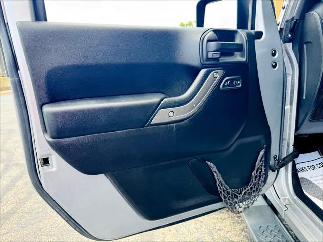 used 2014 Jeep Wrangler Unlimited car, priced at $13,900