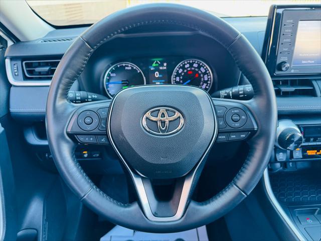 used 2021 Toyota RAV4 Hybrid car, priced at $29,750