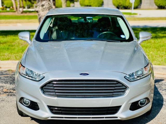 used 2016 Ford Fusion car, priced at $10,900