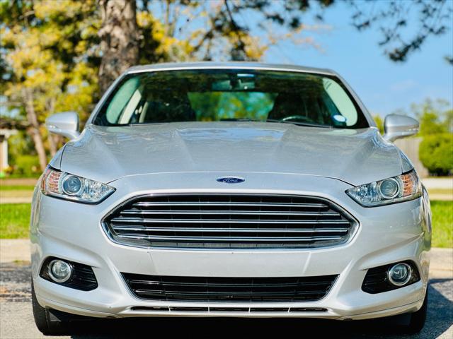 used 2016 Ford Fusion car, priced at $10,900