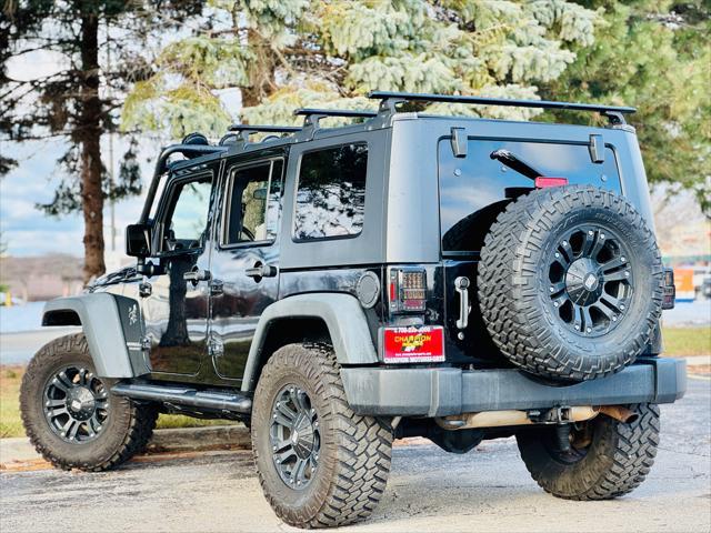 used 2010 Jeep Wrangler Unlimited car, priced at $14,900