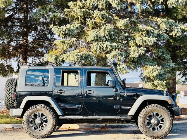 used 2010 Jeep Wrangler Unlimited car, priced at $14,900