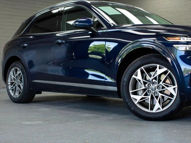 used 2023 Genesis GV70 car, priced at $39,997