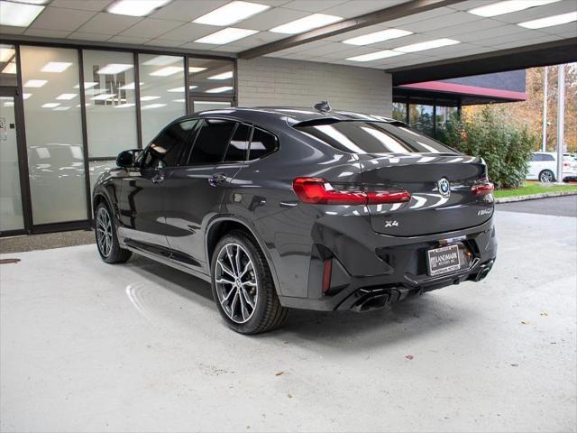 used 2023 BMW X4 car, priced at $58,998