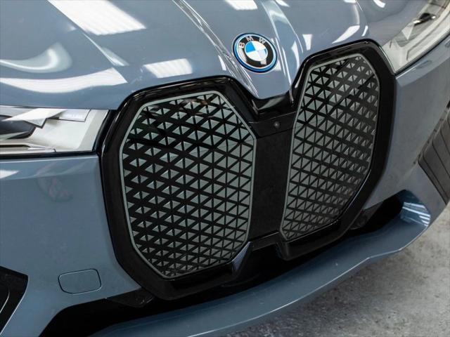 used 2024 BMW iX car, priced at $66,880