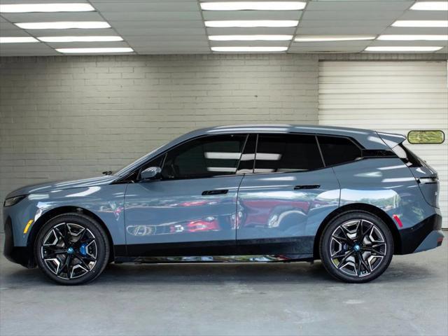 used 2024 BMW iX car, priced at $66,880