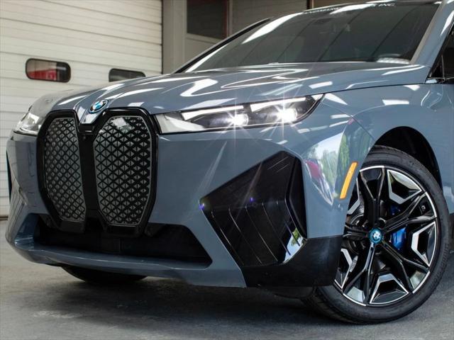 used 2024 BMW iX car, priced at $66,880