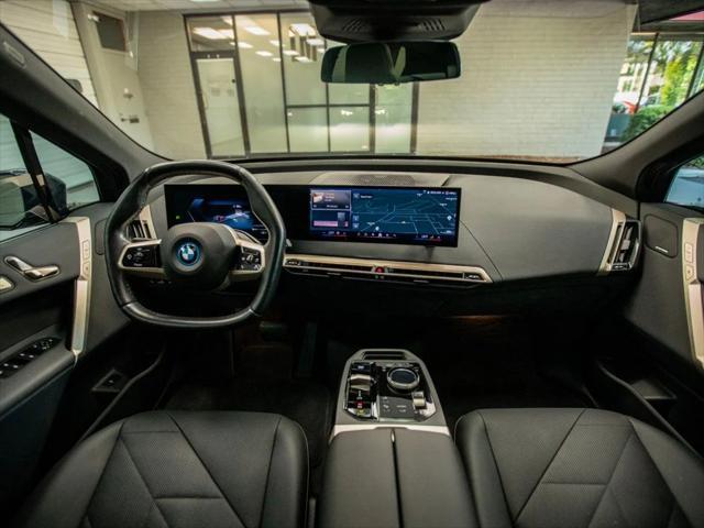 used 2024 BMW iX car, priced at $66,880