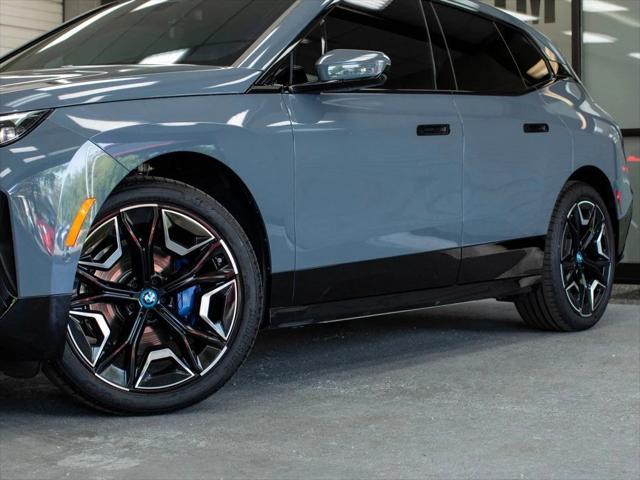 used 2024 BMW iX car, priced at $66,880
