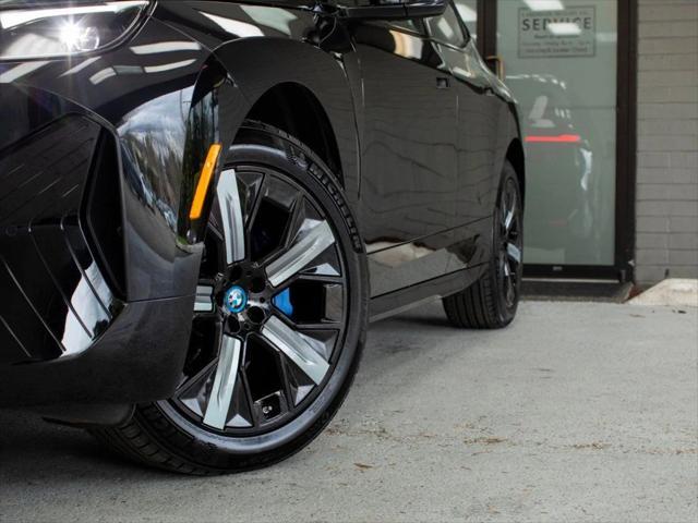 used 2024 BMW iX car, priced at $65,995