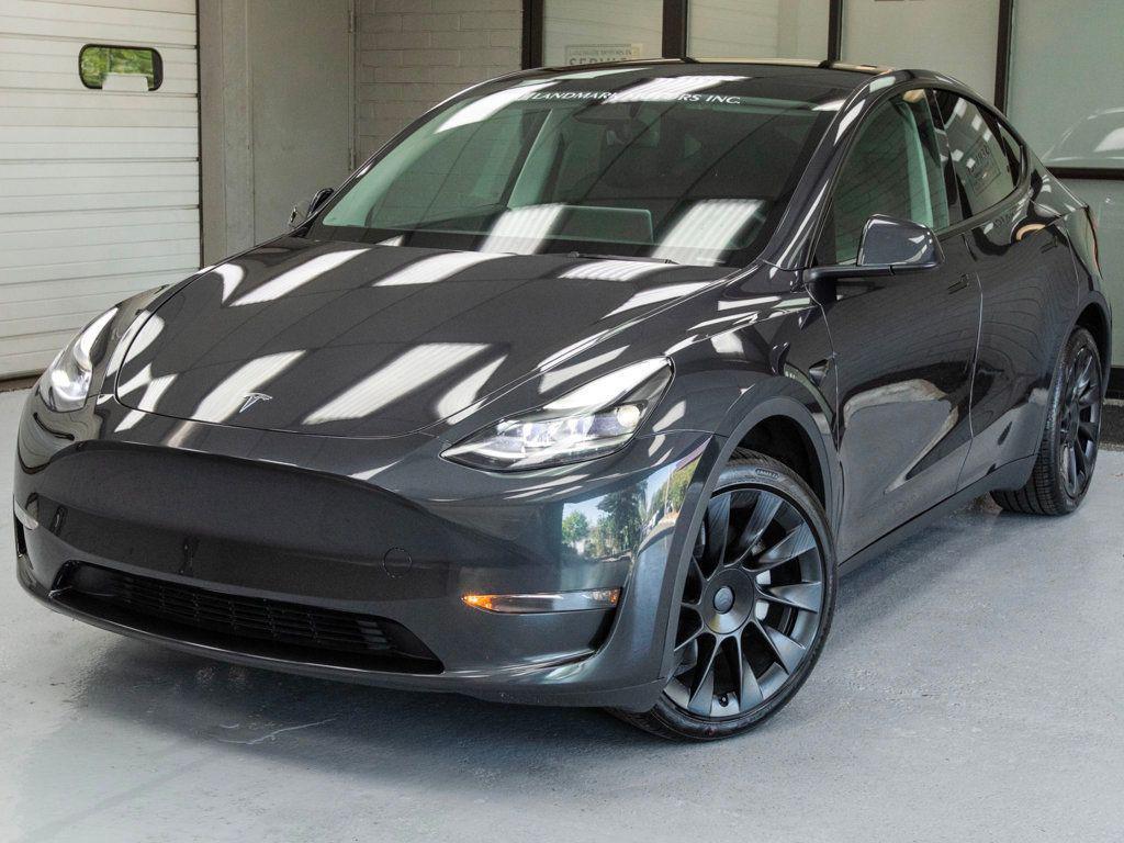 used 2024 Tesla Model Y car, priced at $37,777