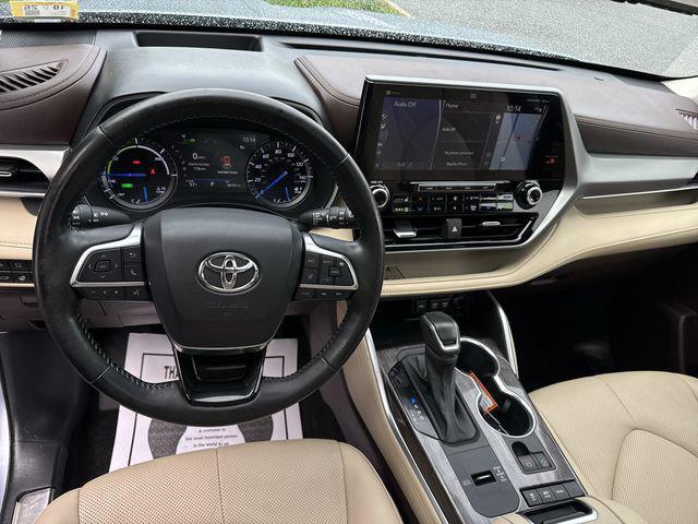 used 2021 Toyota Highlander Hybrid car, priced at $37,000