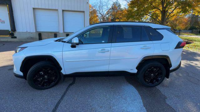 used 2023 Toyota RAV4 Hybrid car, priced at $33,000