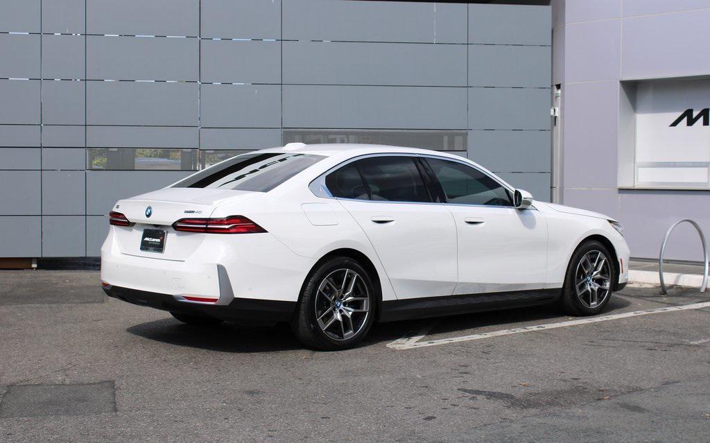 used 2024 BMW i5 car, priced at $53,991