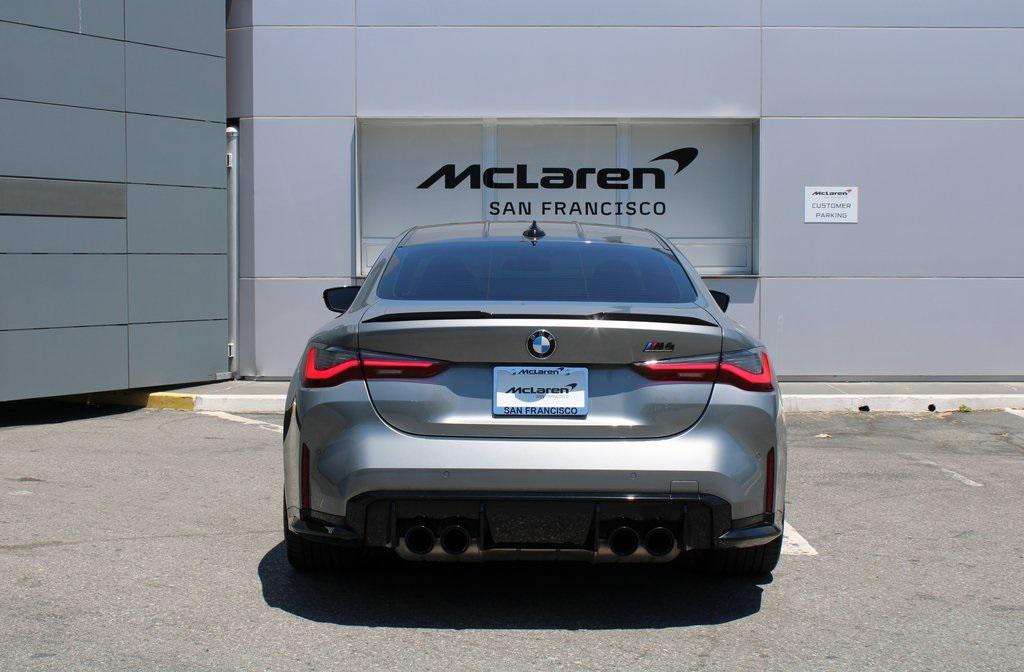 used 2022 BMW M4 car, priced at $67,393